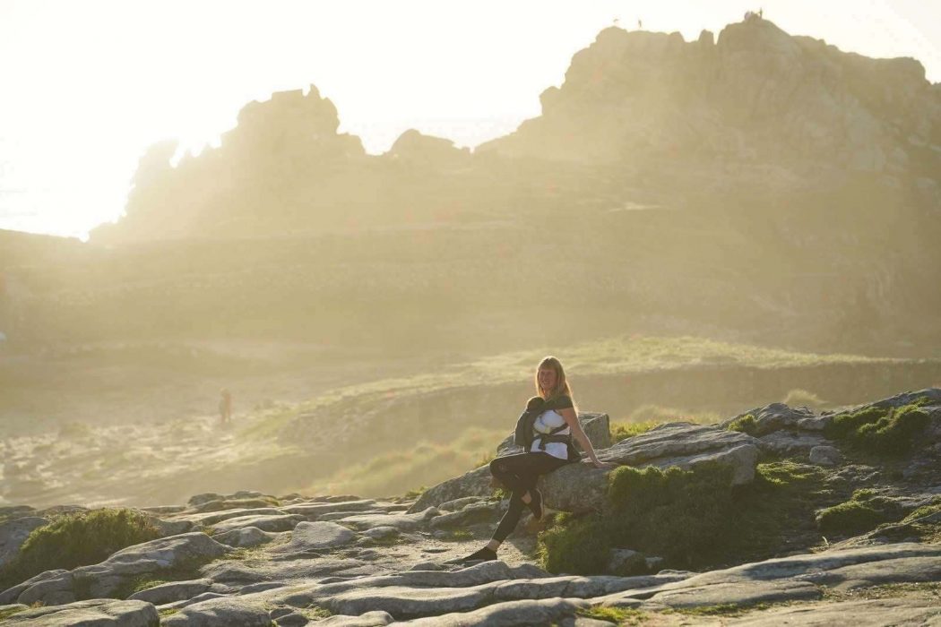 Inma and Asia with the WrapBabyCarrier by Storchenwiege in Castros de Baroña Galicia – Best Baby Carriers for Hiking and Outdoors Lovers